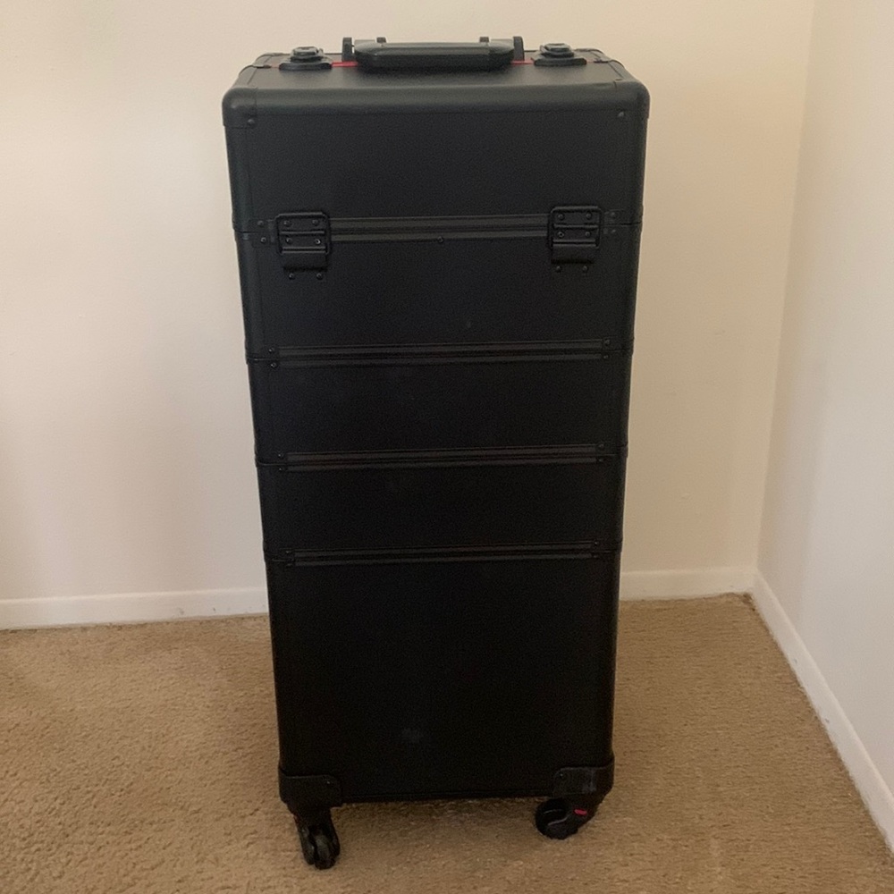 All black makeup luggage case with red accents
